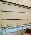 an old-fashioned crawl space door in Carbondale about to be replaced