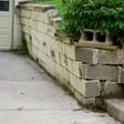 a collapsing retaining wall in Champaign