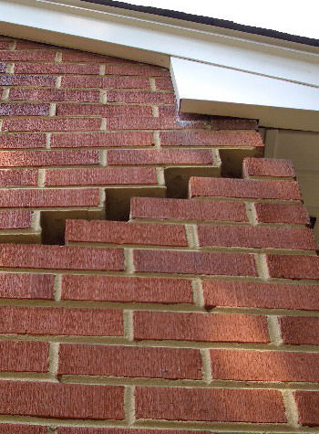 photo of a rotating foundation wall with cracks in Maryland Heights