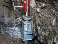 Foundation repair contractors lifting a structure in Springfield.