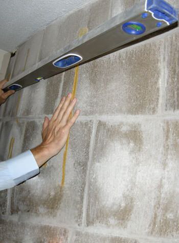 severe foundation wall failure symptoms of a basement wall in Pacific