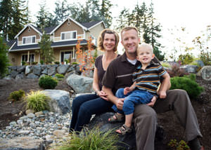 A happy family outside a home with a repaired foundation in Jacksonville