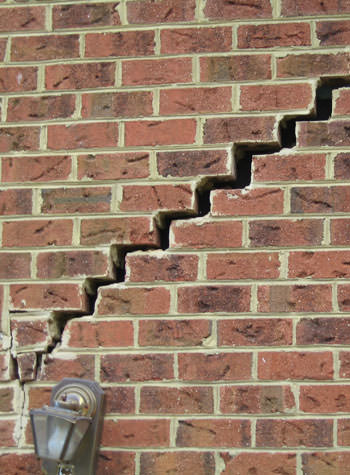 major cracking of a brick foundation wall in Maryland Heights