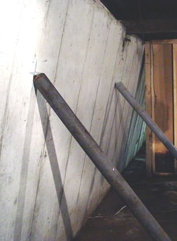 A foundation wall leaning in at the top in Troy