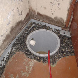 Installing a sump in a sump pump liner in a St. Charles home