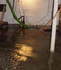 Several feet of floodwaters in a Troy basement