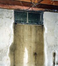 Flooding through basement windows in a Centralia home.