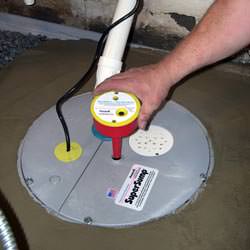 A newly installed sump pump system in a basement in Edwardsville