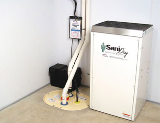 a complete basement waterproofing system installed in a Springfield home