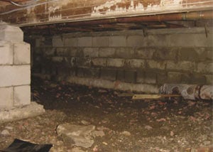 Rotting, decaying crawl space wood damaged over time in Carbondale