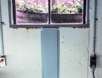 Repaired waterproofed basement window leak in Decatur